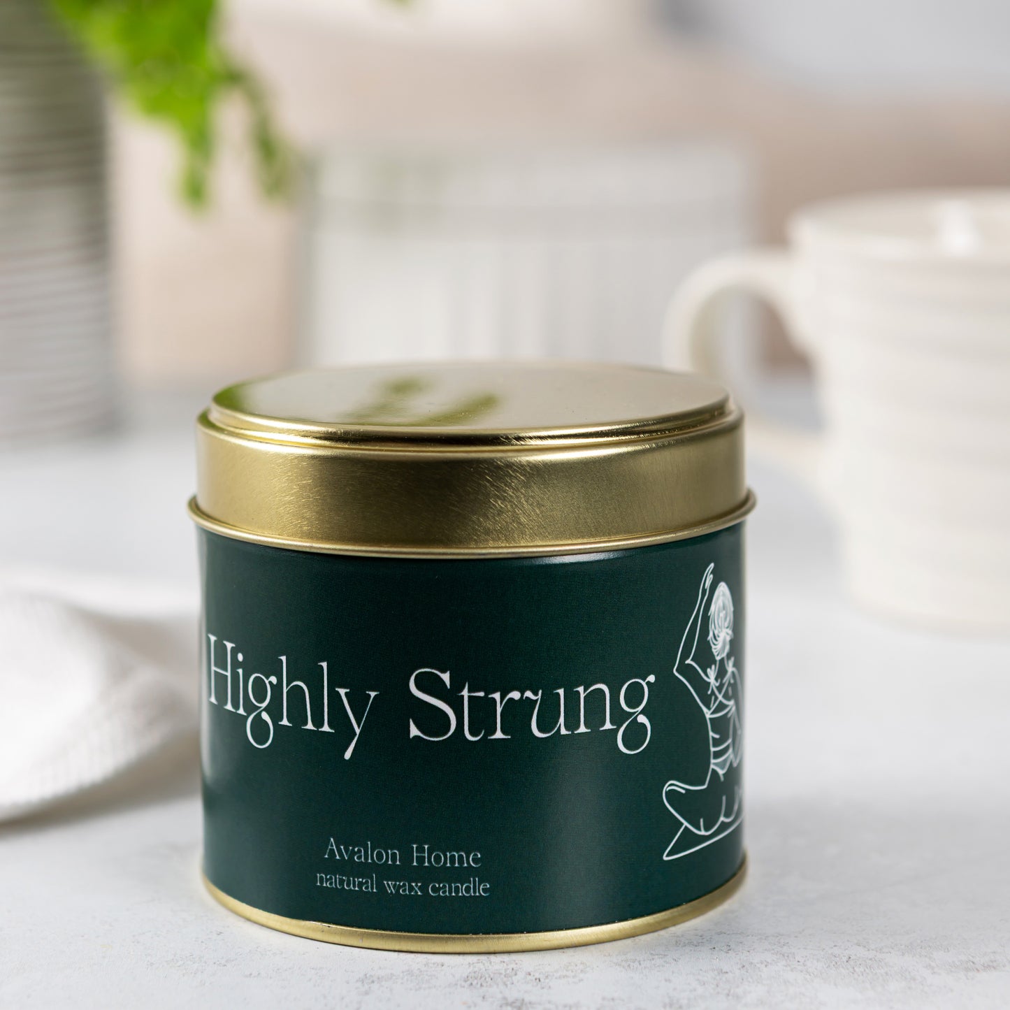 Highly Strung Tin Candle