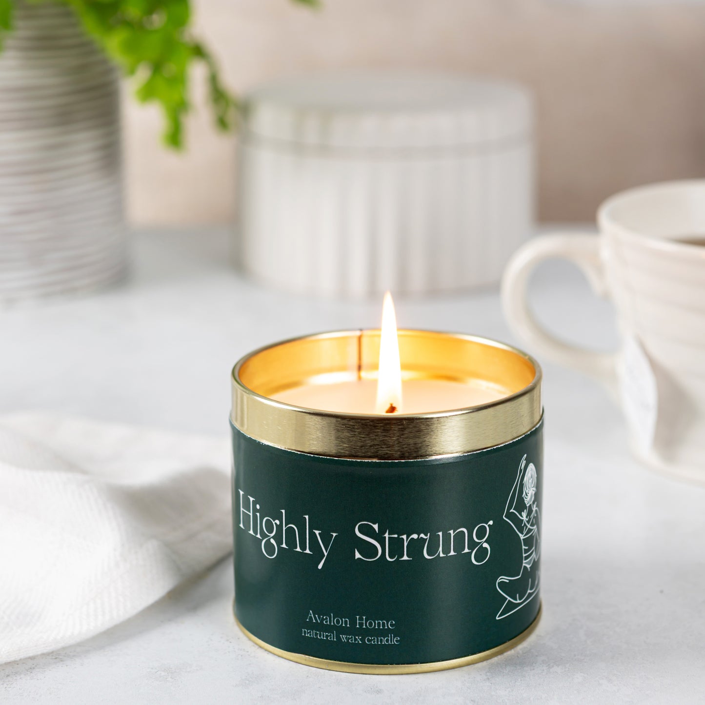 Highly Strung Tin Candle